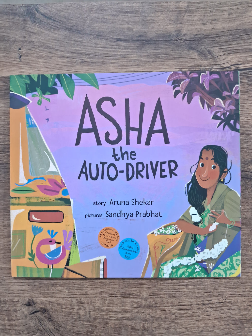 ASHA THE AUTO-DRIVER